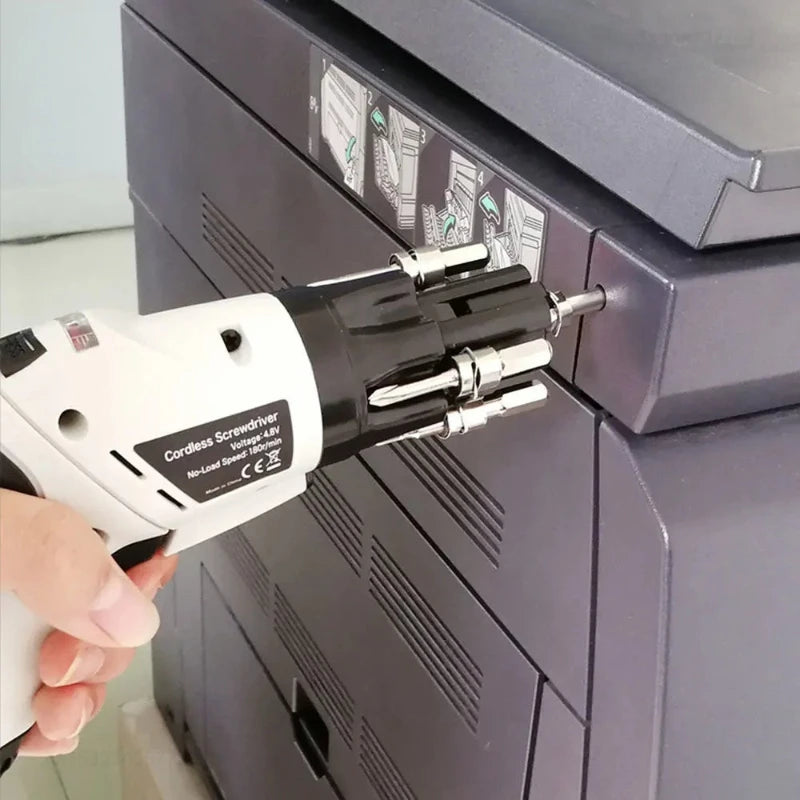 Driving a screw in a cabinet hinge with the screwdriver held one-handed