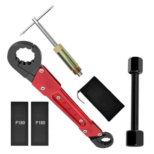 The full kit: the red angle-on wrench, the black socket bar, the sleeve puller, a pouch and two P180 pads