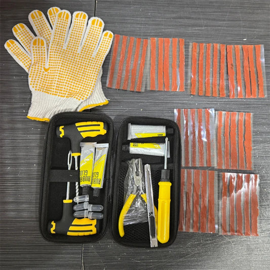 The kit unpacked on a bench: zip case, gloves, rubber strips and the T-handle tools