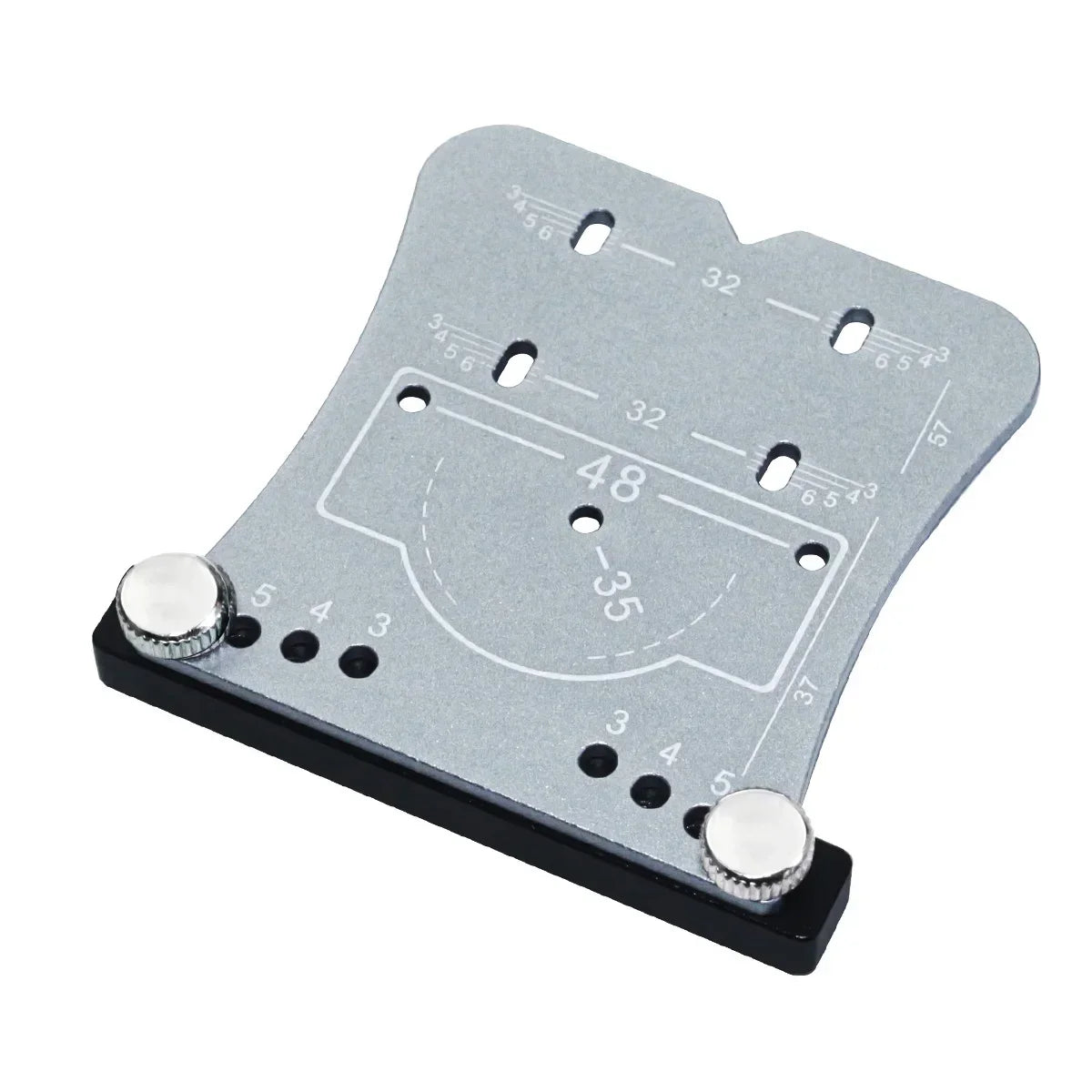 The silver jig seen from the side, showing the fence that registers on the door edge