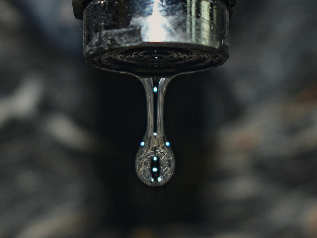Water dripping from a faucet