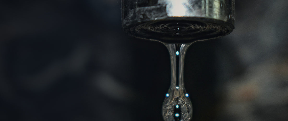 Water dripping from a faucet