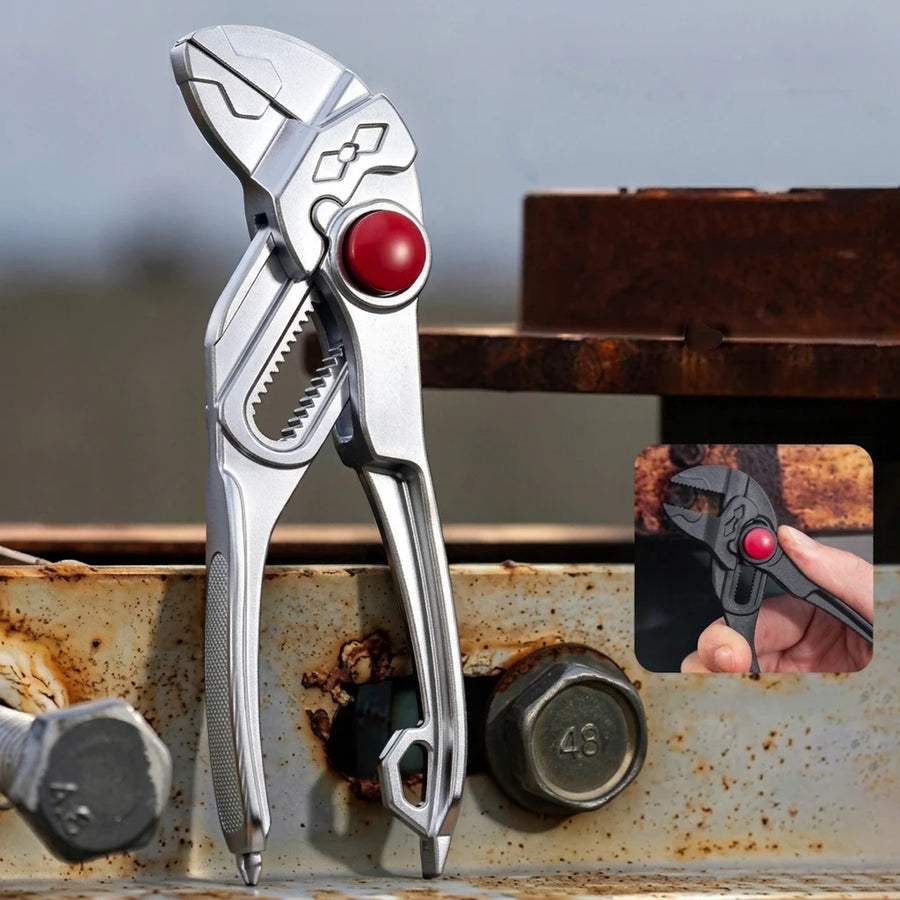 Mini water pump pliers in silver with smooth parallel jaws and a red push button, standing against a steel beam; the inset shows the black version held in one hand