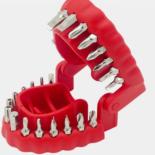 Red denture-shaped case opened like a mouth, with screwdriver bits standing in both jaws like teeth