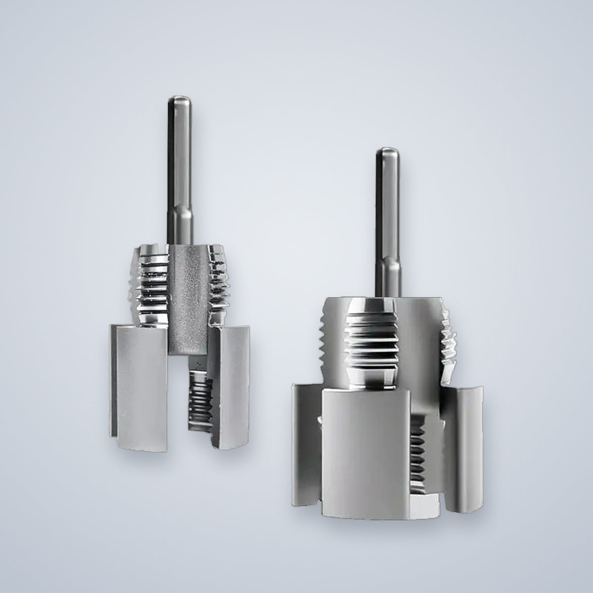 The 1/2 in and 3/4 in threading tools, each with its drive shaft fitted