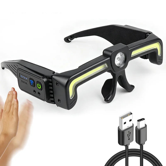 The glasses light with its USB-C cable, and a hand waving at the sensor