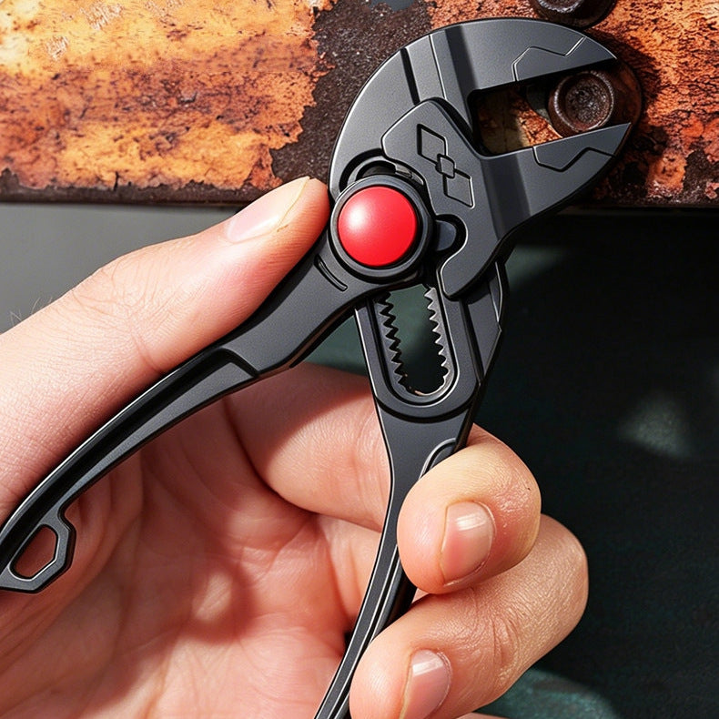 The black pliers with smooth jaws on a rusted nut, held in one hand