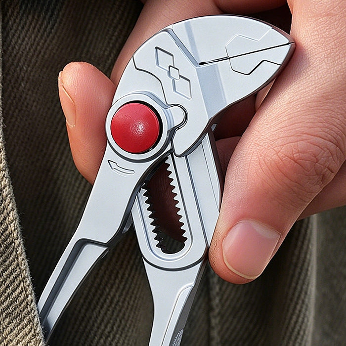 The silver pliers being slipped into a pants pocket
