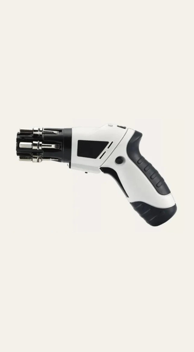 The screwdriver from the side with six bits loaded in the nose drum