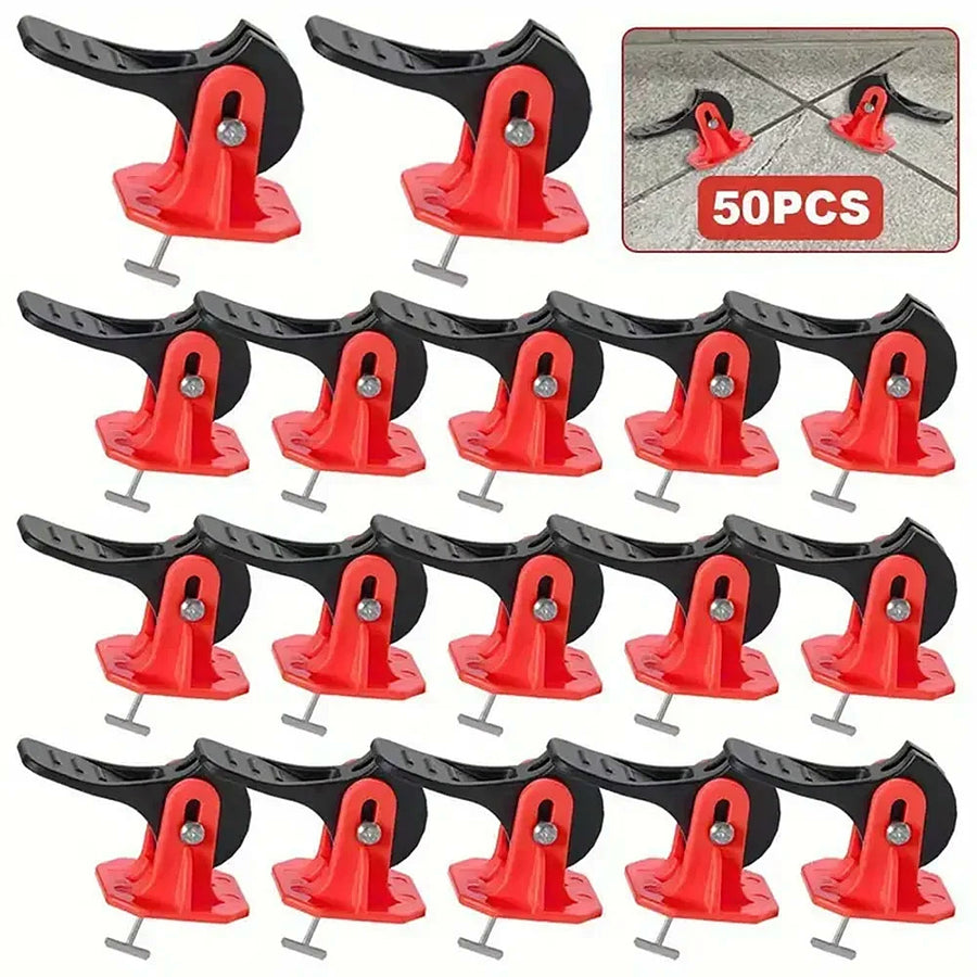 Fifty red and black tile levelers, each with a steel T-pin