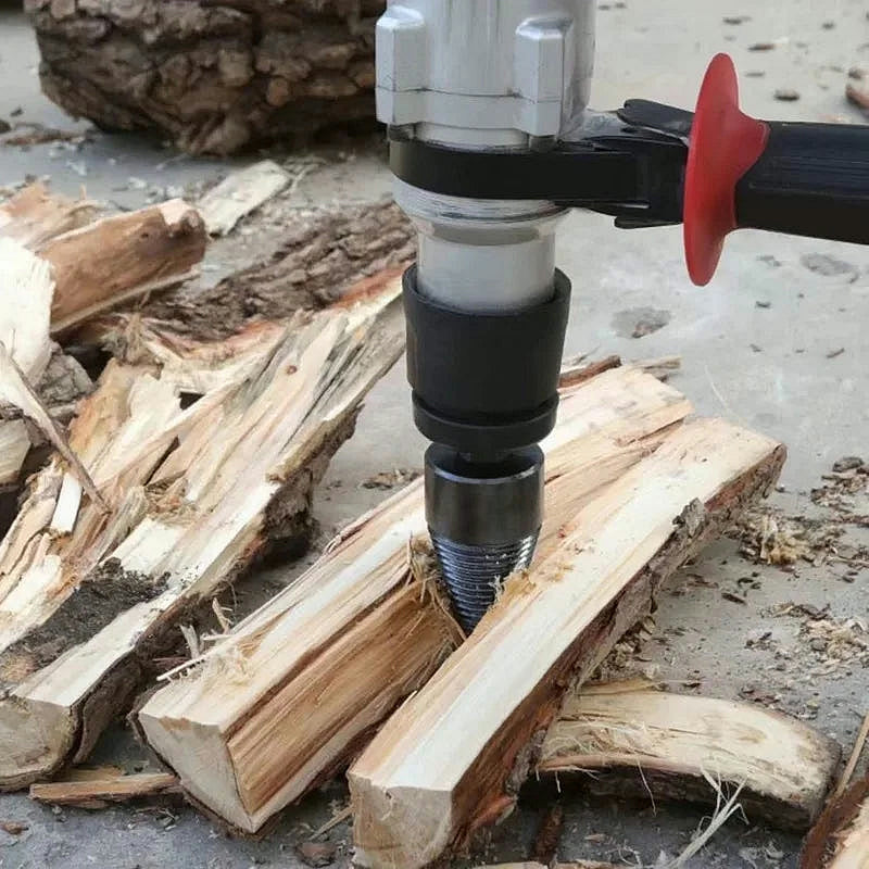 A drill with the cone splitting a log into pieces